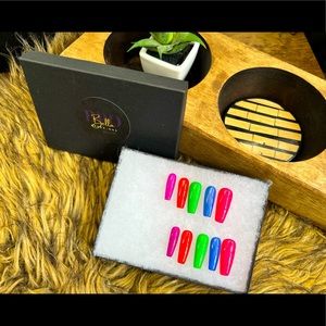 Press on nails. Rainbow 🌈 colors made for a fun person. 🥰